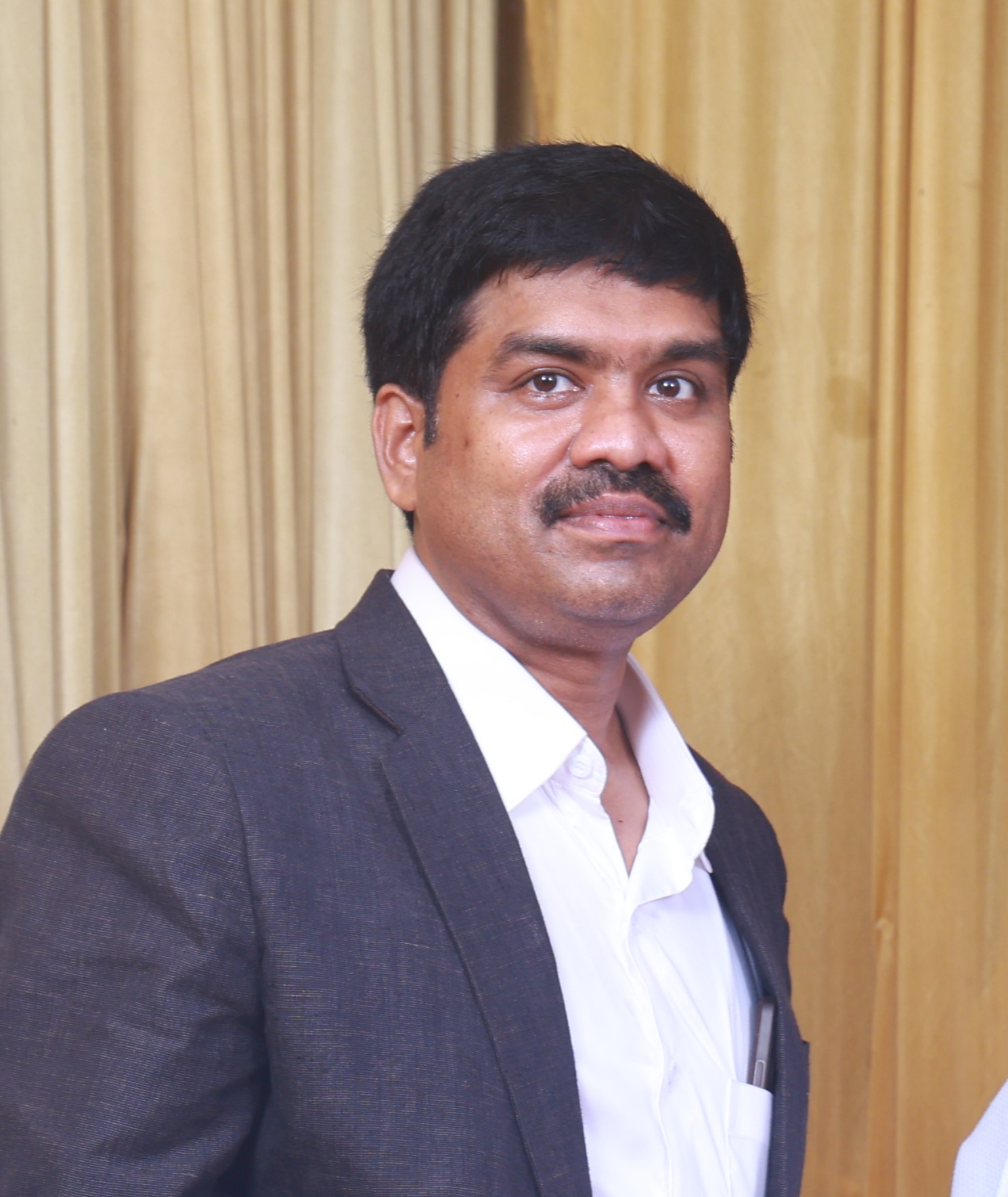 Dr. B MANIMARAN